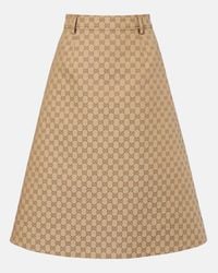 Gucci GG Logo Print Pleated Midi Skirt in Brown | Lyst Gucci GG Logo Print Pleated Midi Skirt in Brown | Lyst