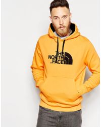 yellow the north face hoodie