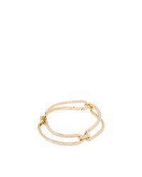 Balenciaga | Metallic Pale Gold Asymetric Bow Necklace | Lyst