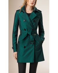 teal trench coat