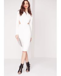 long sleeve open back midi dress