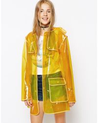 clear green raincoat