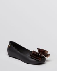 black jelly ballet flats