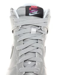 silver high top nikes