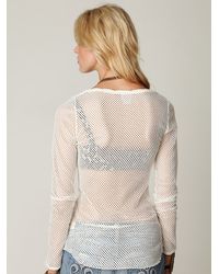 white fishnet long sleeve top