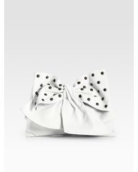 RED Valentino | Black Matte Studs Bow Convertible Clutch | Lyst