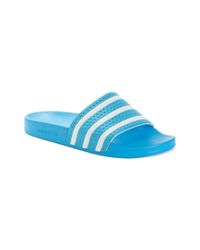 turquoise adidas slides