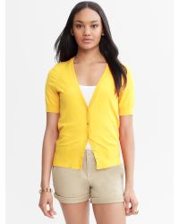 yellow short sleeve sweater