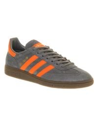 grey orange shoes
