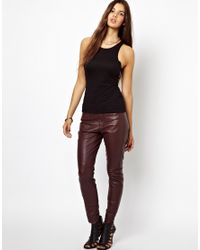 berry leather trousers