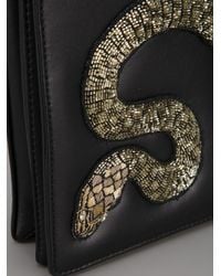 Roberto Cavalli Embellished Snake Clutch in Black - Lyst