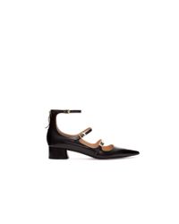 black pointed ballerinas
