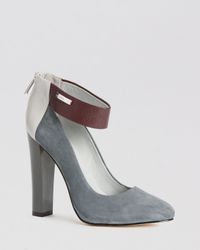 gray pumps with ankle strap