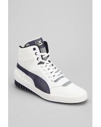 white puma high tops mens