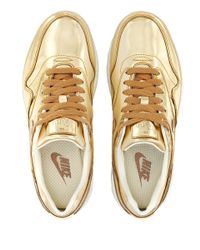 mens gold nike trainers