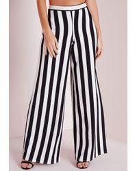 black and white striped wide leg trousers