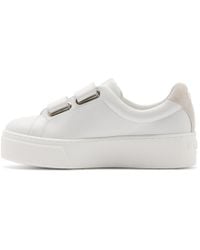 white velcro strap trainers