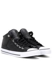 black leather high top chuck taylors