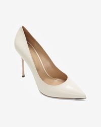 shiny white pumps