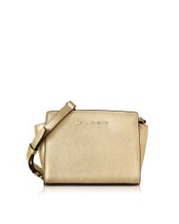 Michael Kors | Pale Gold Metallic Saffiano Leather Selma Mini Messenger Bag | Lyst