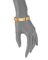 Tory Burch | Metallic Logo Stud Bangle Bracelet/goldtone | Lyst