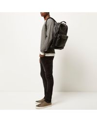 River Island Black Perforated Front Backpack for men