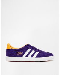 dark purple trainers