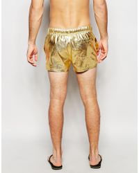 mens metallic gold shorts