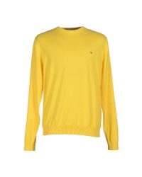 yellow tommy jumper