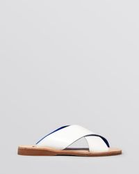 white flat slide sandals