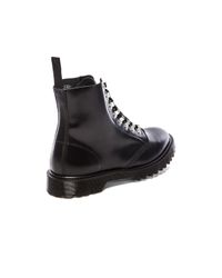 dr martens assange