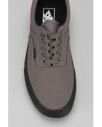 vans era black sole