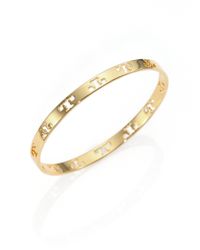 Tory Burch | Metallic Pierced T Logo Bangle Bracelet | Lyst