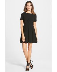 short black fit and flare dress