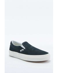 dark blue vans slip ons
