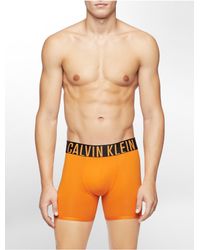 orange calvin klein men's underwear