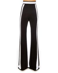 white pants with black side stripe