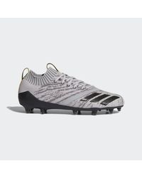 grey adidas football cleats