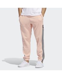 adidas pink tracksuit mens