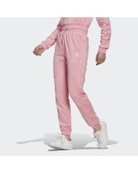 adidas LOUNGEWEAR Slim Jogginghose in Pink - Lyst