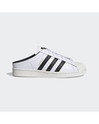 Low heren adidas instappers | KLEDING.nl