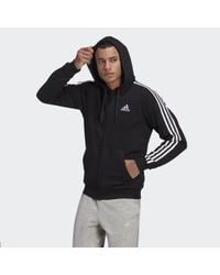 Veste à capuche Essentials Fleece 3-Stripes Full-Zip adidas pour homme en  coloris Noir | Lyst