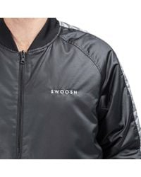 Nike Synthetic Swoosh Reversible Woven Bomber Jacket in Black for 