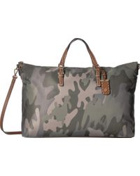 Tommy Hilfiger Holdalls and weekend bags for Women - Up to 27% off at  Lyst.com