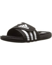 adidas Slippers for Women - Up to 40% off at Lyst.com