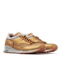 new balance leder herren gold