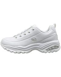 white skechers slip on trainers