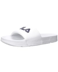 Fila Flip-flops and slides for Women - Up to 40% off at Lyst.com