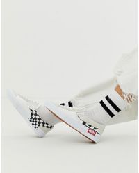 vans slip on cap on feet