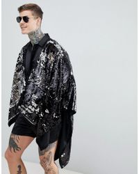 black sequin cape
